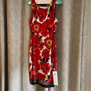 Cache sleeveless floral dress. Never been worn.
